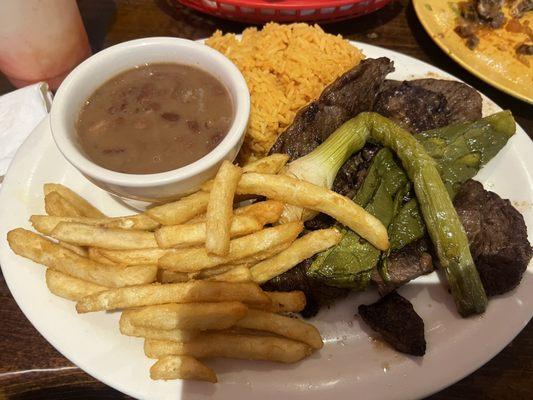 French Fries Rice and Beans Steak with Onions