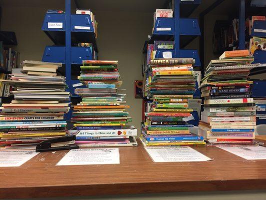 Book donation/ cleaning project with Next Door of Milwaukee