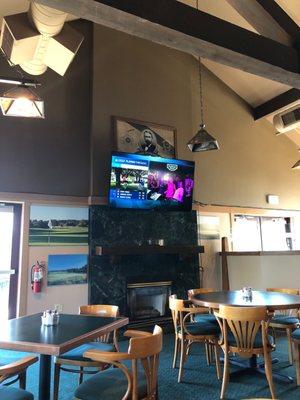 One of 4 TV in dining room. More TVs in bar.