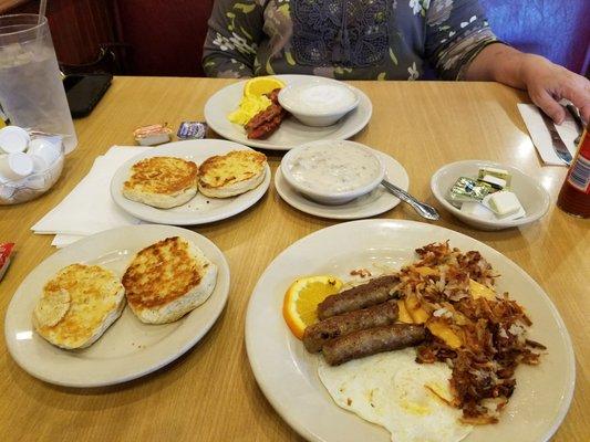 Breakfast for the 2 of us.   Notice the grilled biscuits.   Nice nice touch!