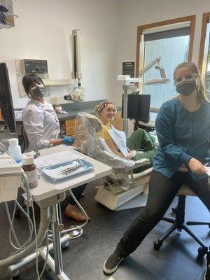 Dr. Mazareei & her lovely assistant Sam, finishing up with a patient.