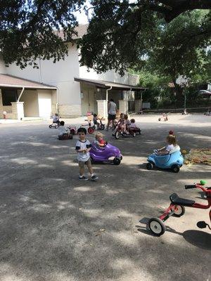 The 'slab' where we ride bikes and play outside.