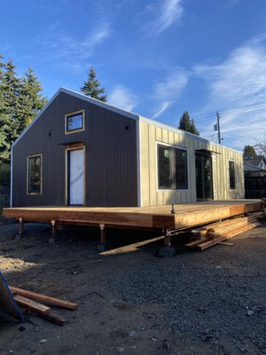 Windows installation, siding installation, and deck.