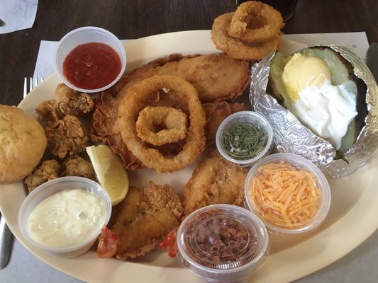 Tank's option: fried fish, 2 shrimp, 4 oysters, onion rings, your choice tater/fries, plus trip to salad/soup bar  under $14!!