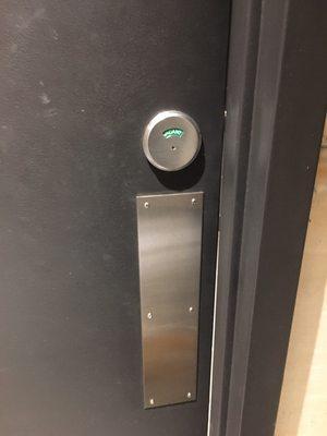 Install smart digital lock on a bathroom door of a Resturant- before photo.