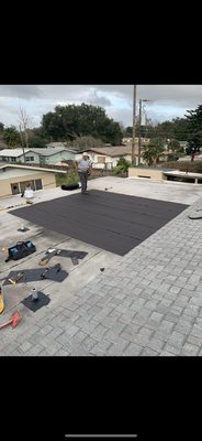 (During) Plywood Replacement and #30 Felt Underlayment Installment.