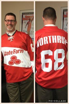 Scott shows off his new State Farm jersey!