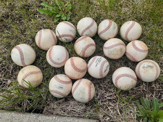 Baseballs over the fence.