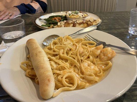 Lobster sauce with shrimp on fettuccine.  Love this dish