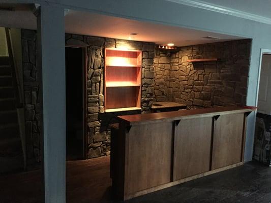 Wet bar in Aldie, Va. Custom built bar and shelves, Eldorado stone and new handscraped flooring.