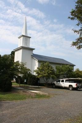 Historic Church with a Black standing seam metal roof