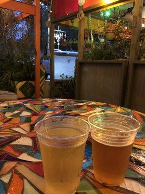 Mosaic table outside seating with a couple of delicious beers from local breweries