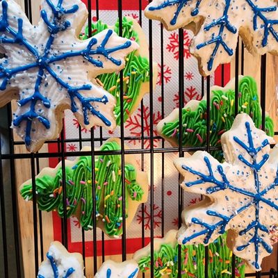 Cut-out sugar cookies with different mixtures of frosting, Royal Icing, and/or sprinkles.