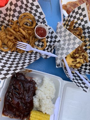 Bbq ribs $13, curly fries, chili cheese fries