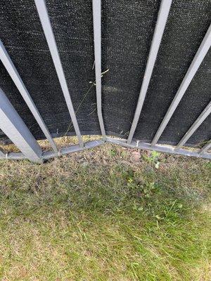 Damage to private fence caused by EcoLawn