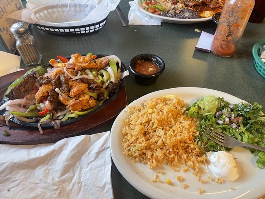 Combo fajitas beef and chicken, double rice an fixings this is great stuff. The hot sauce an chips are good also . Yummy!!!