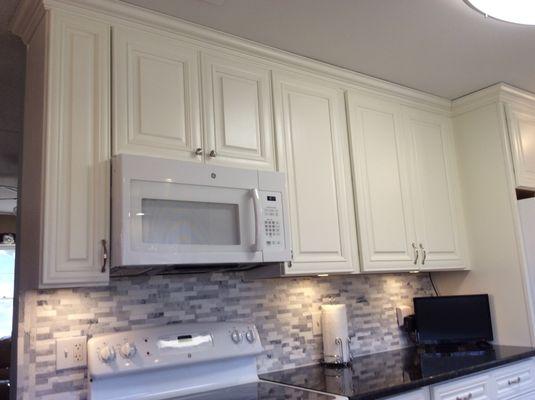 Soffit out, larger cabinets IN!  Don't mind getting a step stool out to enjoy all the space clear to the ceiling!