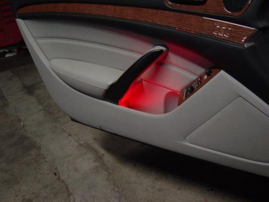 Red LEDs in door panel for highlighting