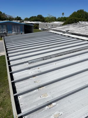 Standing seam metal that has old screw holes that are now leaking.