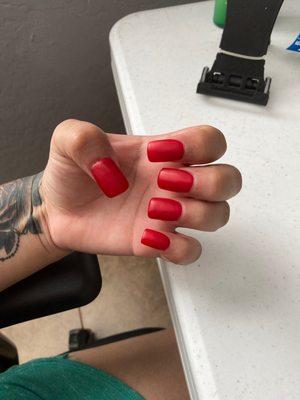 Left hand is short acrylic square red matte color.