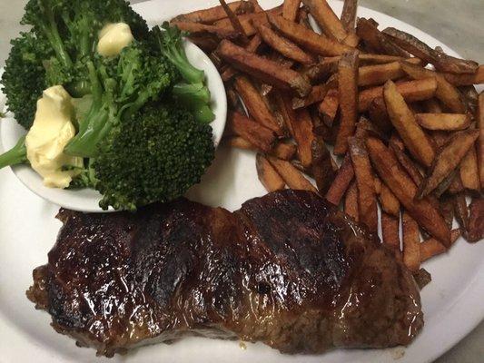 Premium Angus New York strip with fries and broccoli