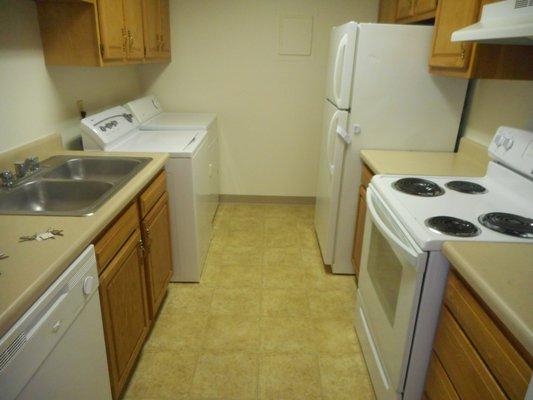 Upgraded kitchen with appliances, cabinets and new vinyl. Great Features!