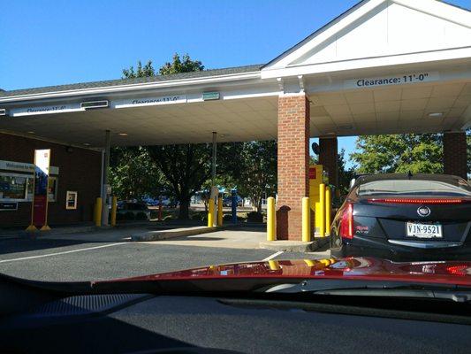 Deposit your money with a teller and it's not as quickly available as it is through ATM. Look at the line. Only at ATM.