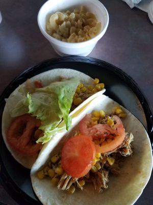 Chicken tacos, mac and cheese.