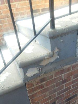 Peeling paint in dirty and never maintained stairwells