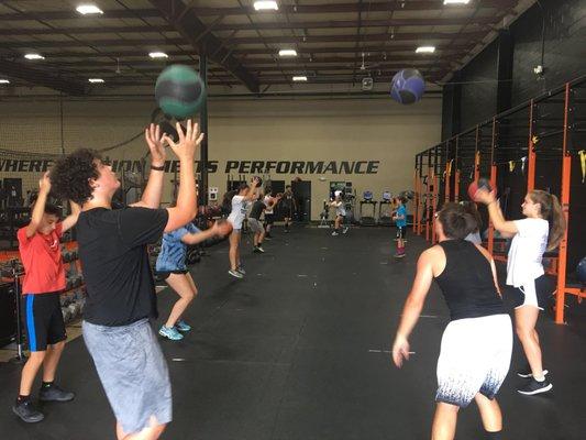 Slam ball exercises for No Days Off high school sports prep camp!