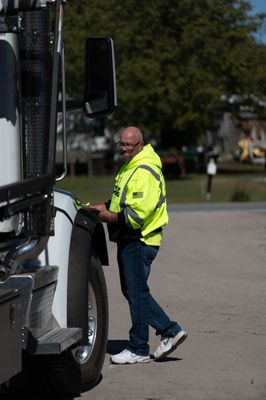 Driver, Danny completing a pre-trip inspection during the 2023 Contest of Champions driving competition.