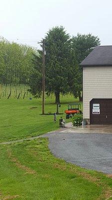 the winery is around back. cute patio. small tasting room with stools