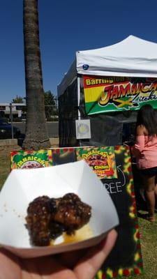 one of the longest lines so I have to see what Jamaican kitchen is all about at the 1st annual wing festival