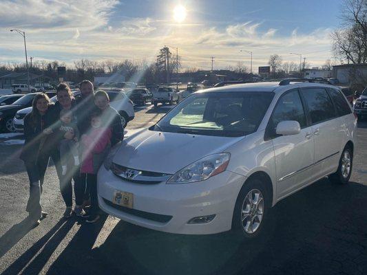 The excited picture of our new family van right after the purchase, before all the deceit was found.