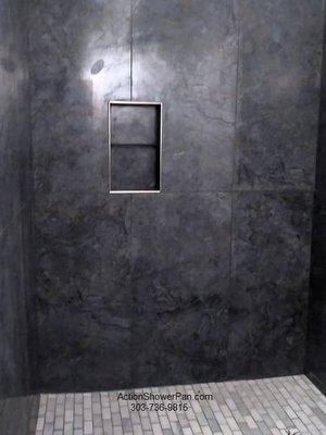 Tile Installers Denver, CO

This shower installation includes large panel porcelain tiles on the walls and marble tile for the shower pan