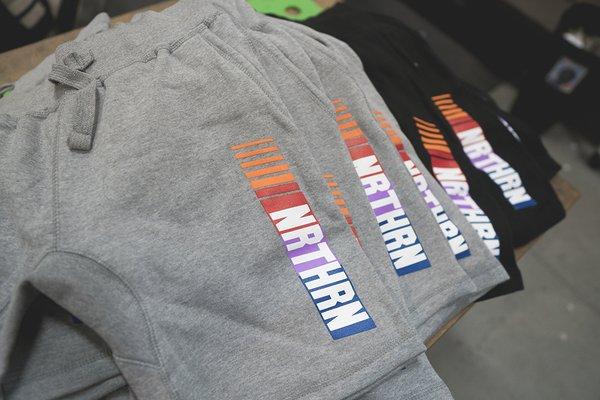 6 color screen print job on these cozy jogger shorts.