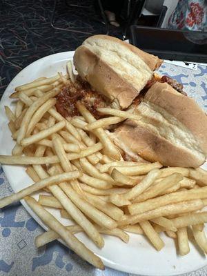 Smashed sandwich and cold/old fries