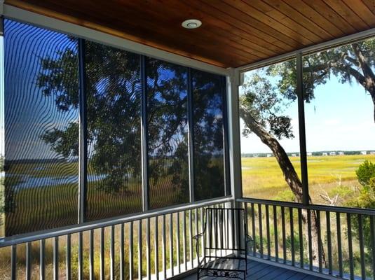 Solar Porch Shades.  Block the wind, rain, heat, and UV rays.