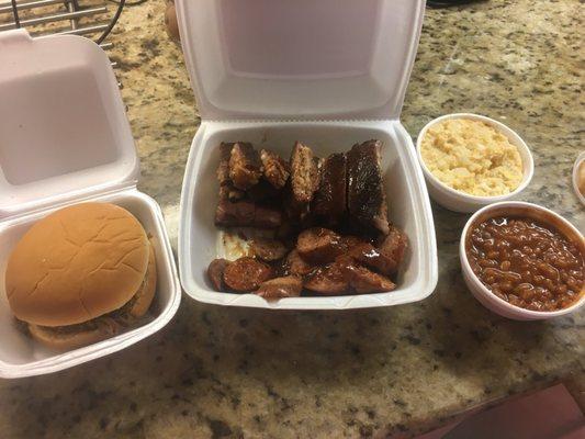 Ribs, hot links, chopped beef sandwich, baked beans and potato salad. Deliciousness!!