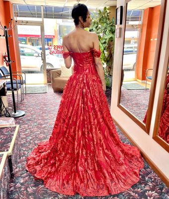 This lady in red is EVERYTHING!  We created this custom gown for Pamela for her wedding vowel renewal.