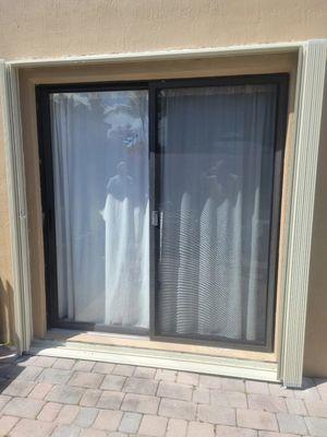 Accordion Shutter on Glass Sliding Door