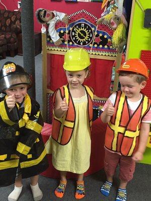 These children are enjoying the dramatic play area in our classroom.