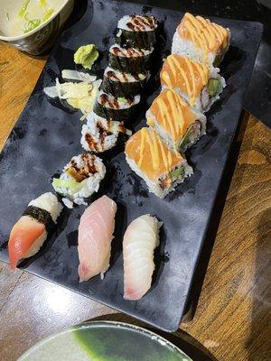 Red clam roll, red snapper roll, and yellowtail roll on the bottom. Spider roll on the top left, the sunshine roll on the top right.