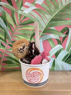 Cookie Monster! Cookies n Cream Dairy Free FroYo topped with Cookie crumbs, circus cookies, chocolate chip cookie and chocolate sauce.