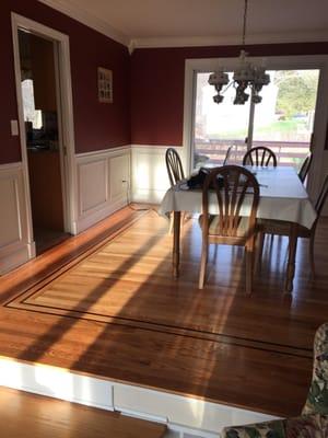 We installed the flooring, crown moulding, chair rail and decorative panel trim, decorative door casing plinth blocks, and ba...