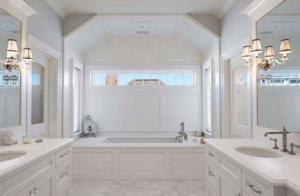 Completely remodeled the bathroom, with custom panels, tiles, tub.
 We also added side windows and a transom