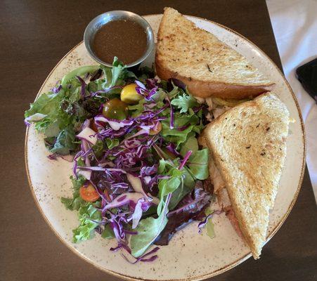 Roasted Turkey sandwich with a side salad