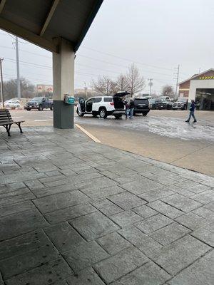 Washing the family car.