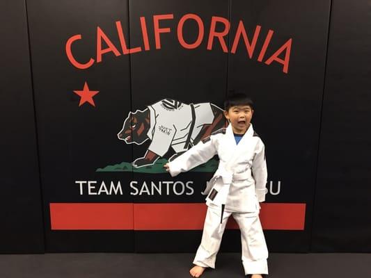 My son posing with his new gi.