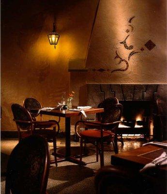 Casablanca Restaurant in Ft. Lauderdale, FL is built with classic tinted plaster walls with shadows painted of palm leaves.